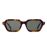 Sunglasses with tortoiseshell frame and dark lenses on a white background