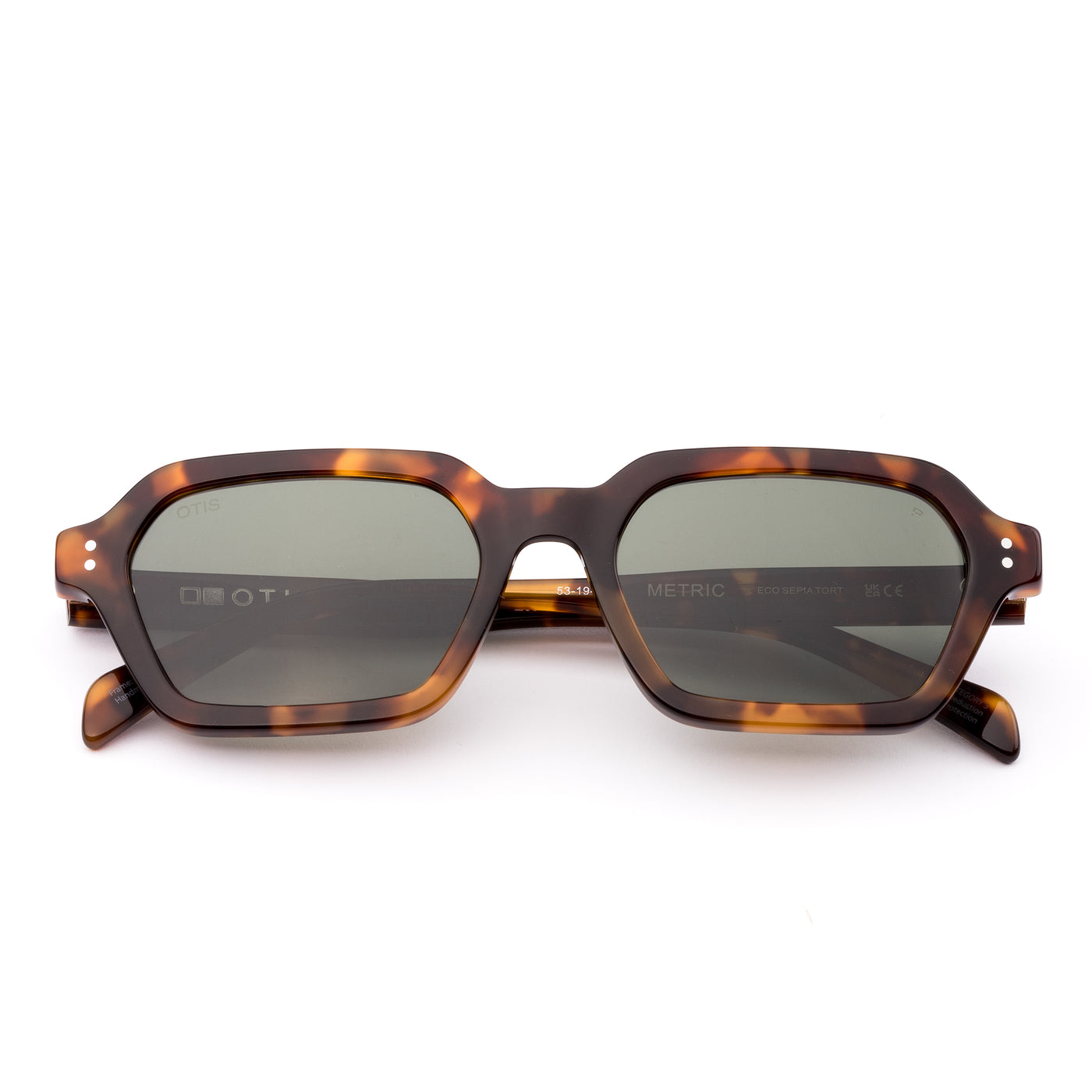 Sunglasses with tortoiseshell frame and dark lenses on a white background