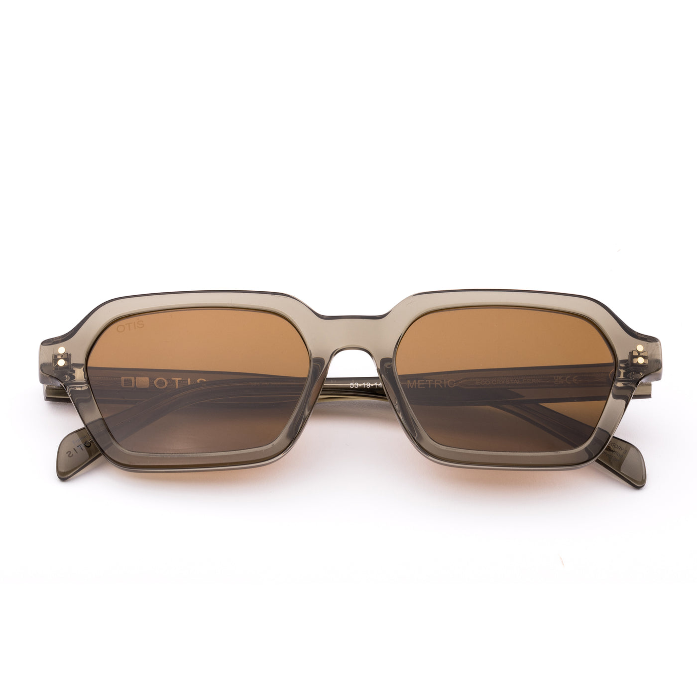 Sunglasses with a green transparent frame and brown lenses on a white background