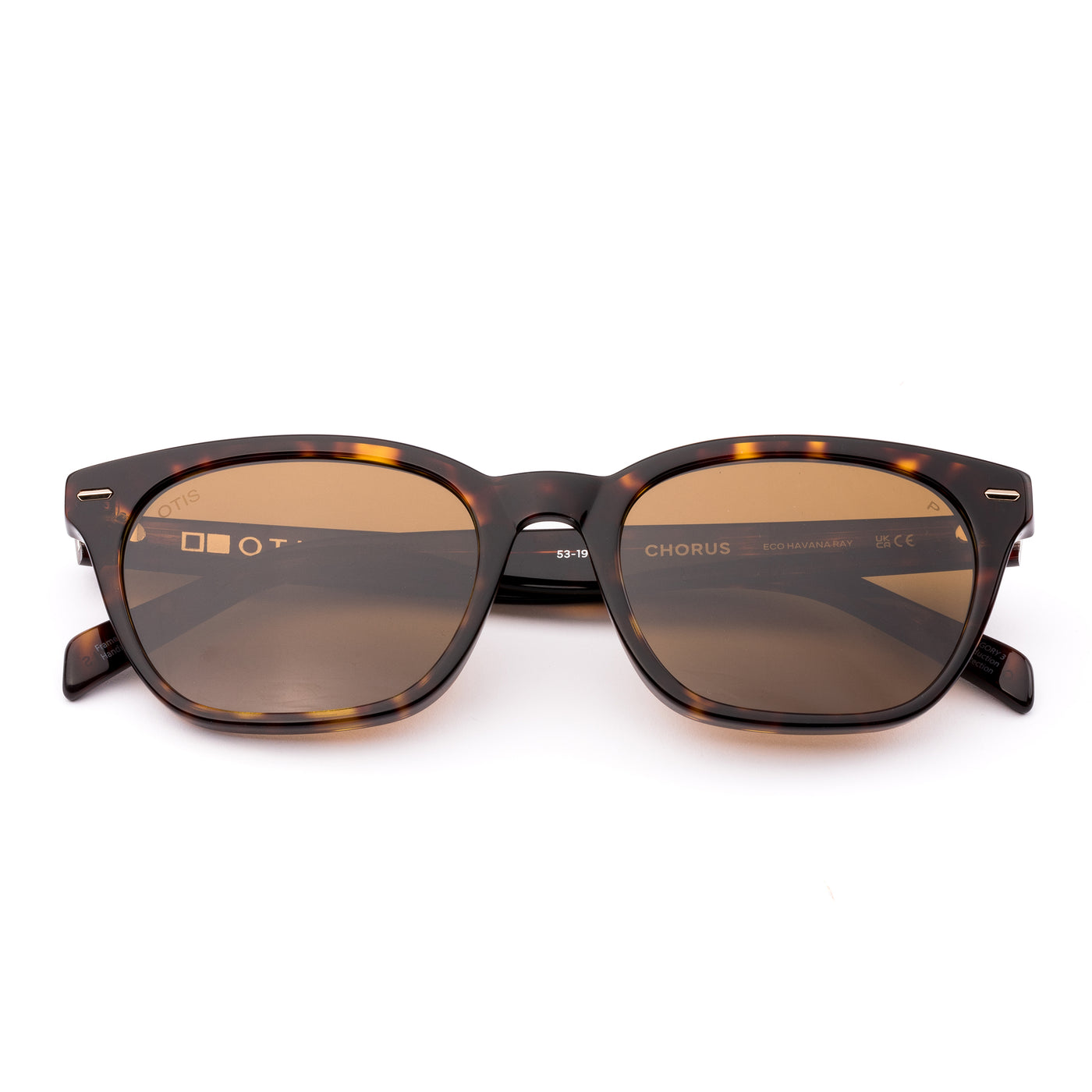 Sunglasses with tortoiseshell frame and brown lenses on a white background