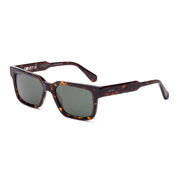 Square sunglasses with a tortoiseshell frame and grey lenses on a white background