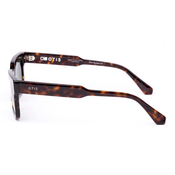 Square sunglasses with a tortoiseshell frame and grey lenses on a white background