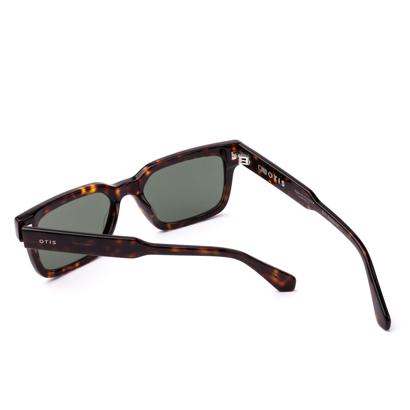 Square sunglasses with a tortoiseshell frame and grey lenses on a white background