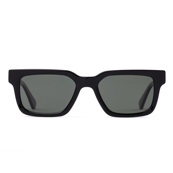 Black sunglasses with dark lenses on a white background
