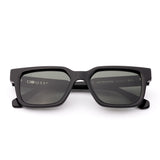 Black sunglasses with dark lenses on a white background