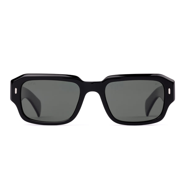 Square sunglasses with a black frame and grey lenses on a white background