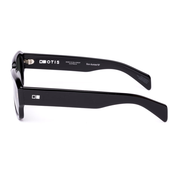 Square sunglasses with a black frame and grey lenses on a white background