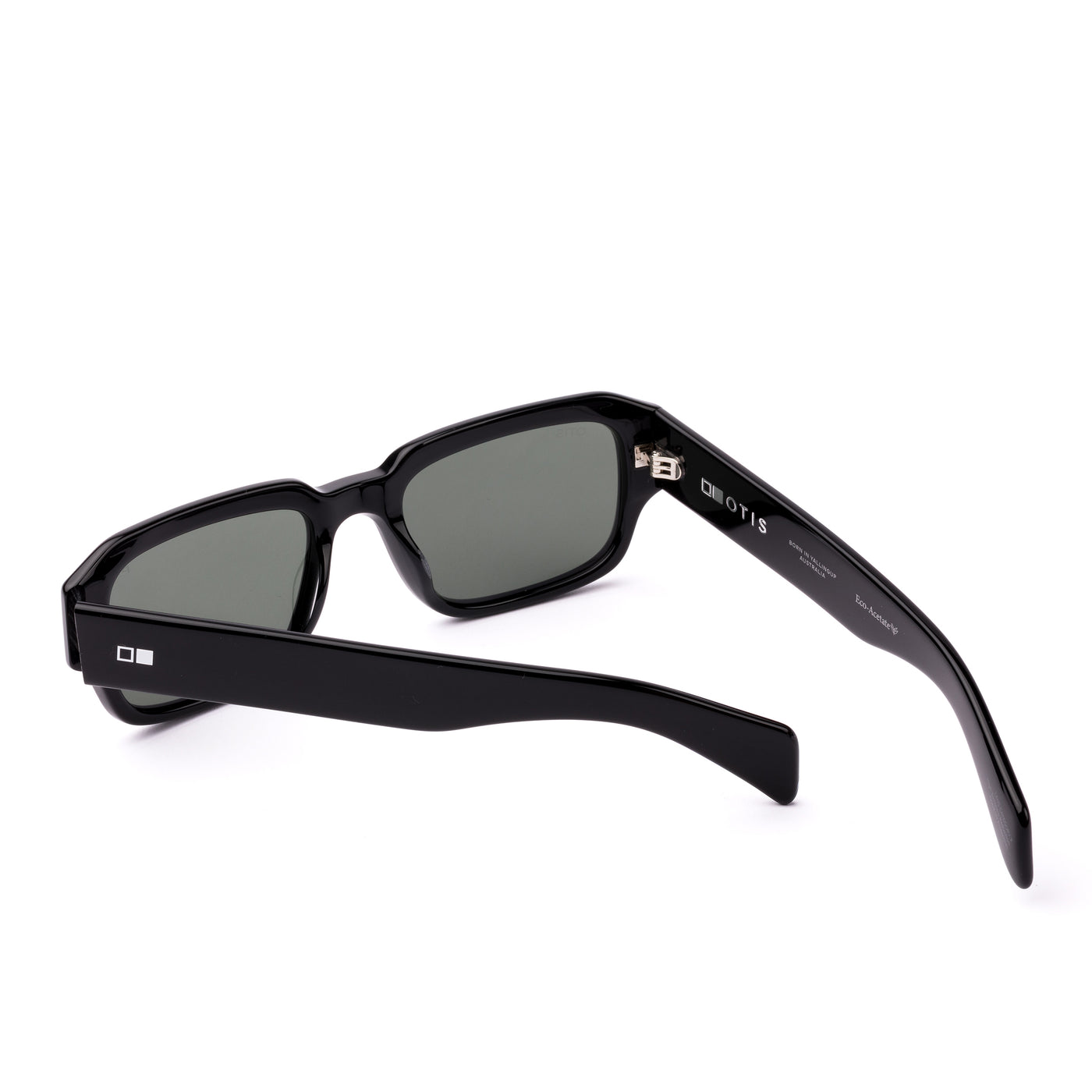 Square sunglasses with a black frame and grey lenses on a white background
