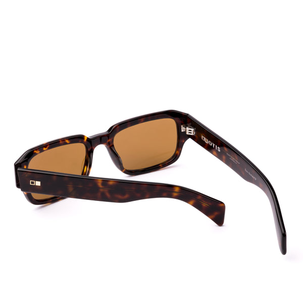 Square sunglasses with tortoiseshell frame and brown lenses on a white background
