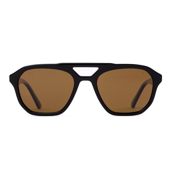 Aviator sunglasses with brown lenses and black frame on a white background.