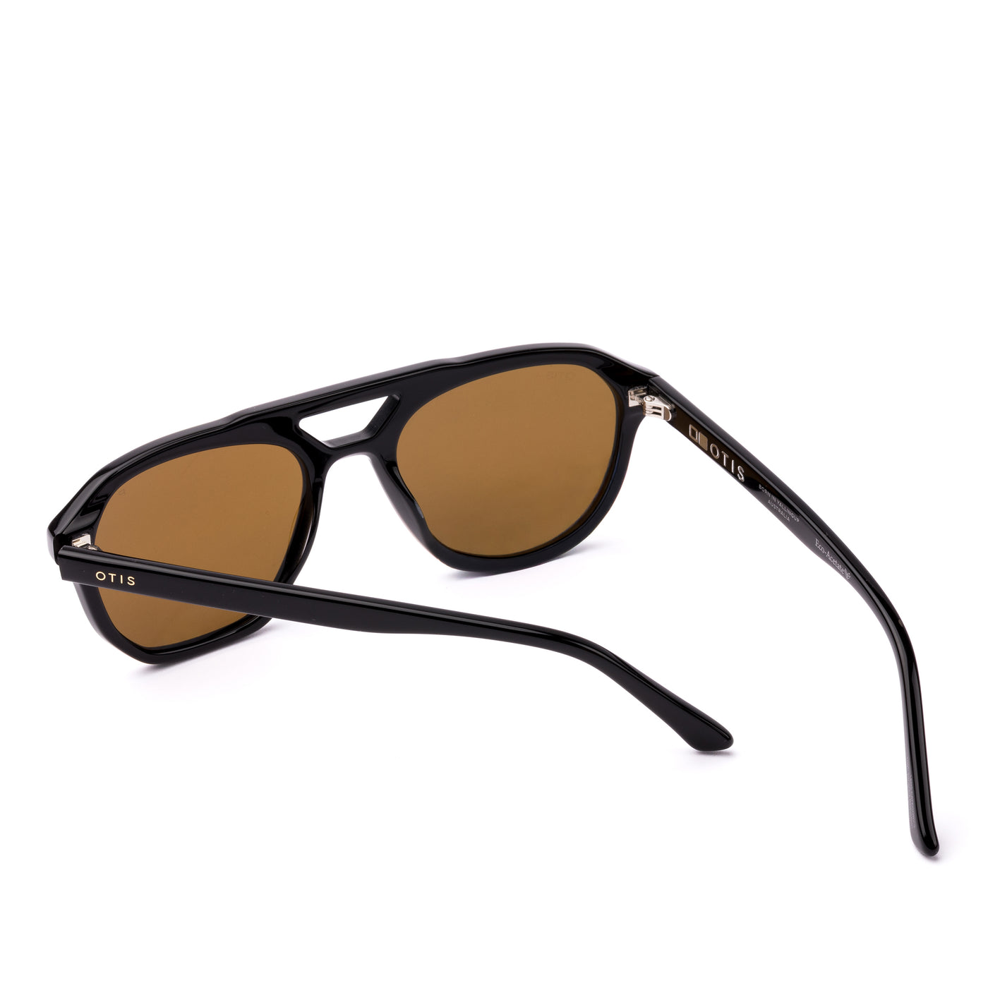 Aviator sunglasses with brown lenses and black frame on a white background.