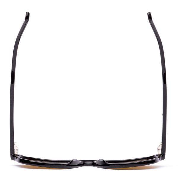 Aviator sunglasses with brown lenses and black frame on a white background.