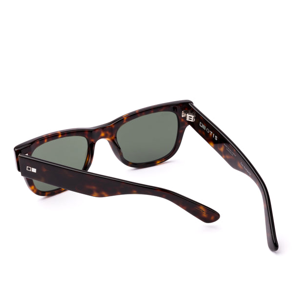 Wayfarer sunglasses with tortoiseshell frame and dark lenses on a white background