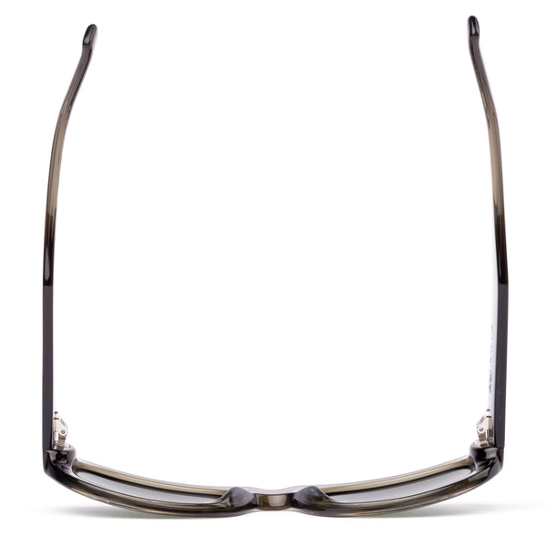 Sunglasses with a green transparent frame and dark lenses on a white background