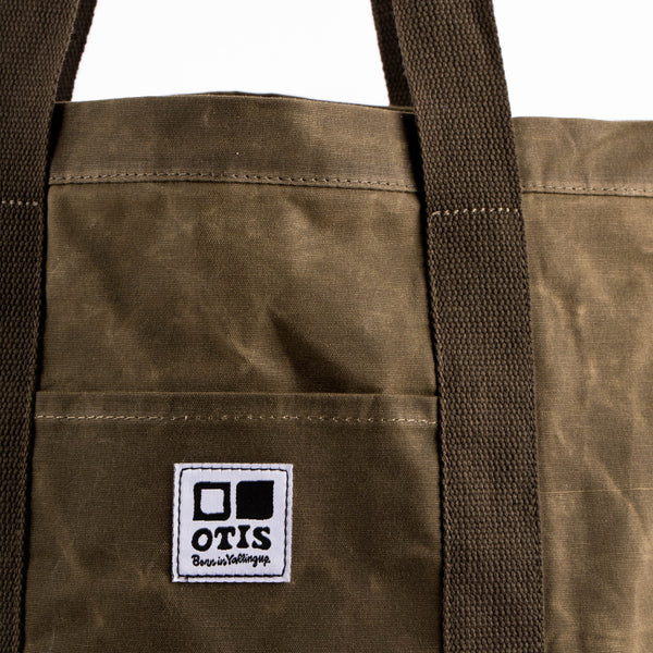 Army Green Waxed canvas tote bag with OTIS logo stitched onto front