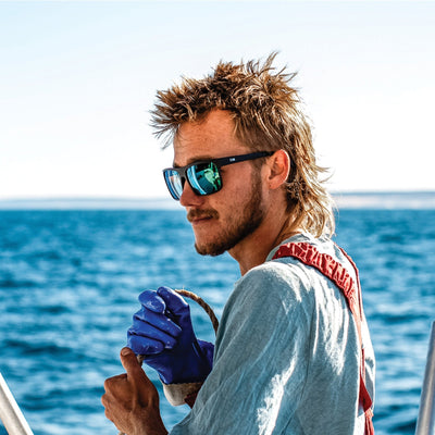 Fisherman pulling up cray pots and wearing OTIS Eyewear polarised sunglasses