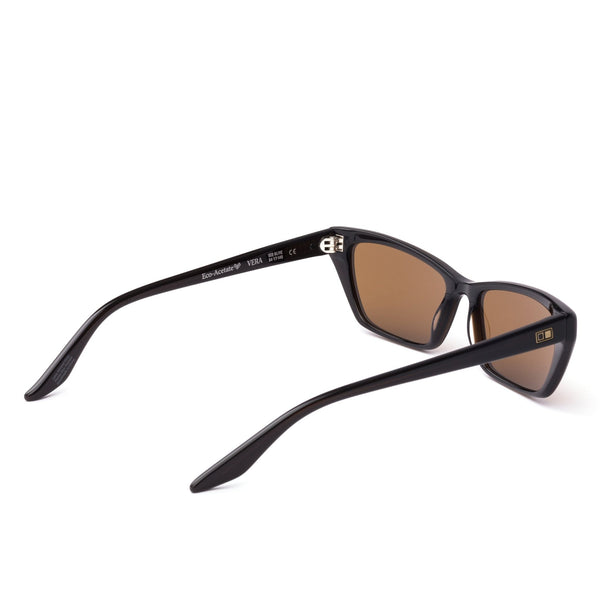 Dark brown OTIS Eyewear sunglasses with brown lenses facing the away